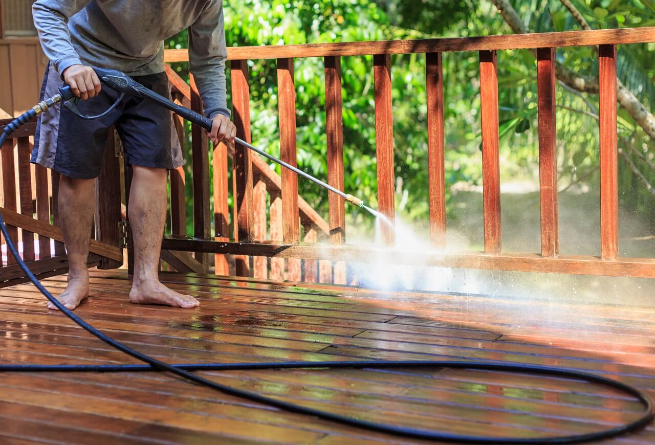 summer home maintenance includes cleaning the deck